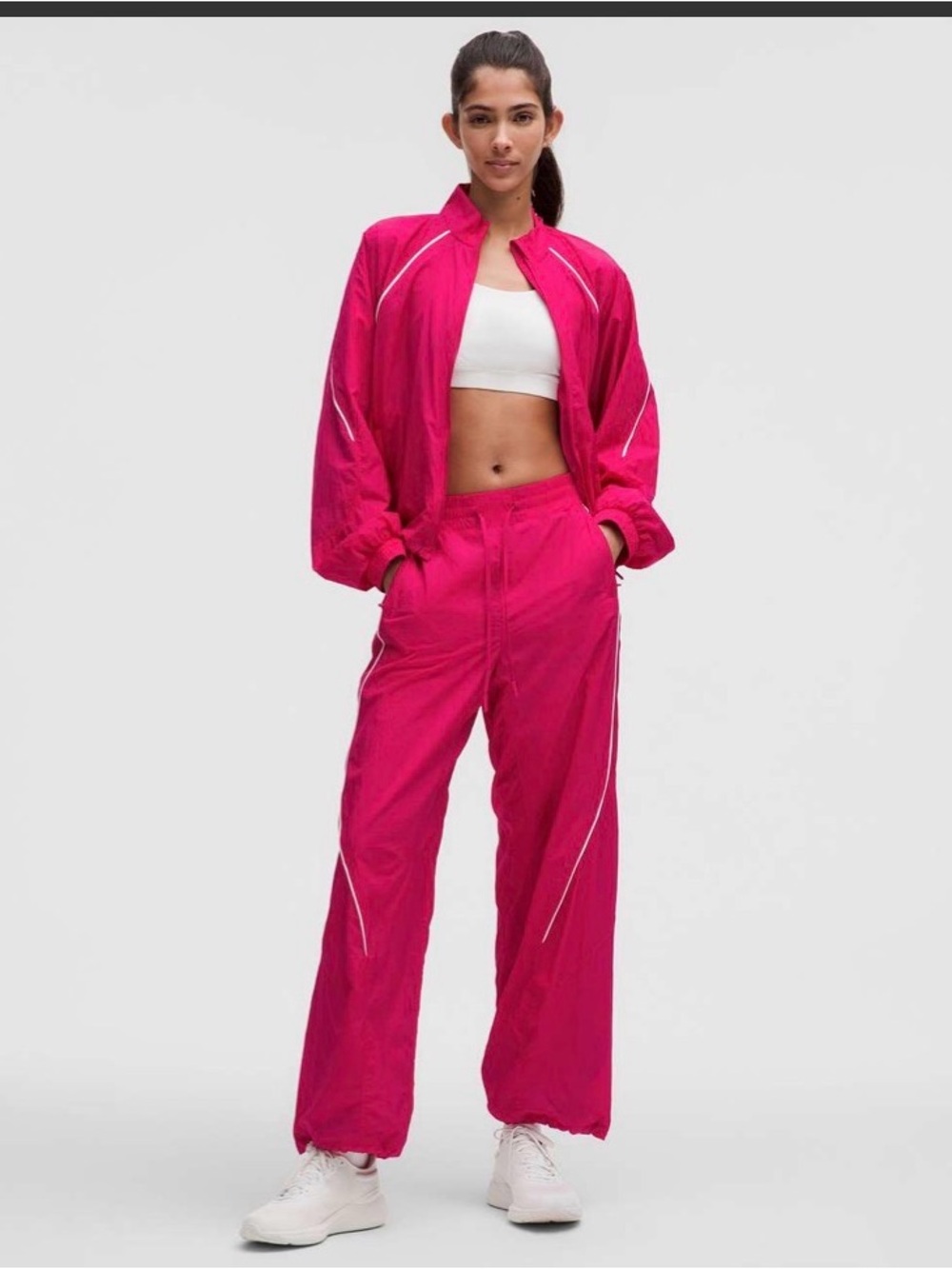 Lululemon License to Train Lightweight Jacket and Mid-Rise Jogger in Hot Pink